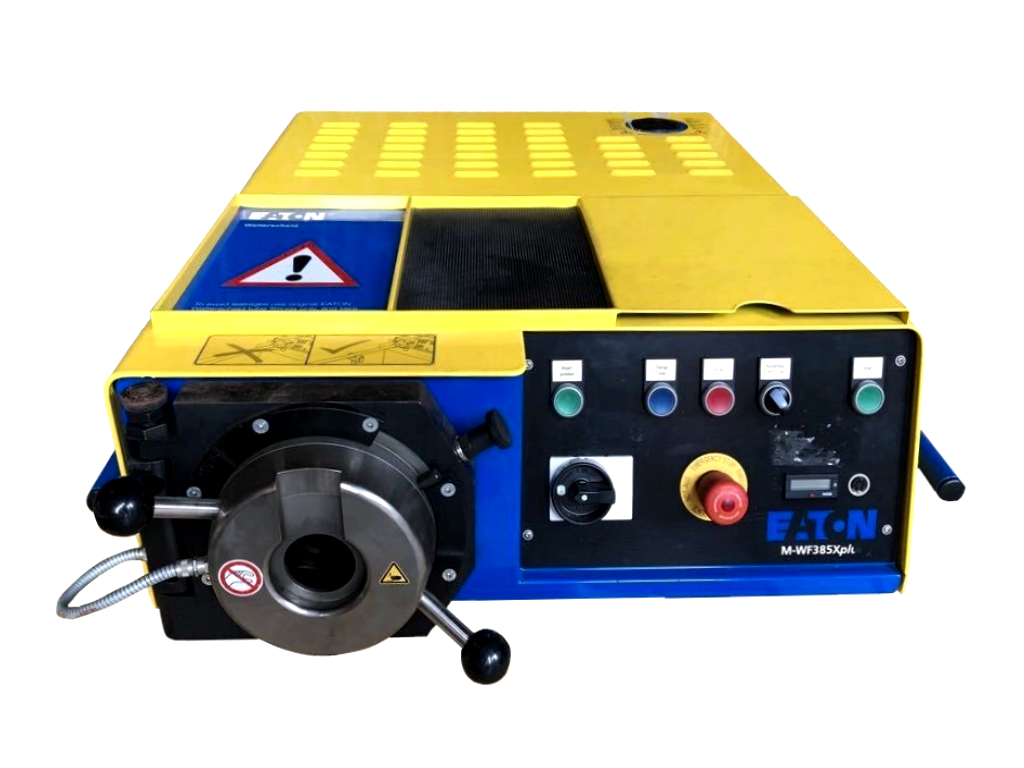 Eaton Walform machine type M-WF385Xph, showing the round tool holder with its two handles on the left and the control panel with indicator lamps, master switch and emergency stop on the right