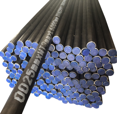 Bundle of hydraulic steel tubes with blue end caps, marked along the length