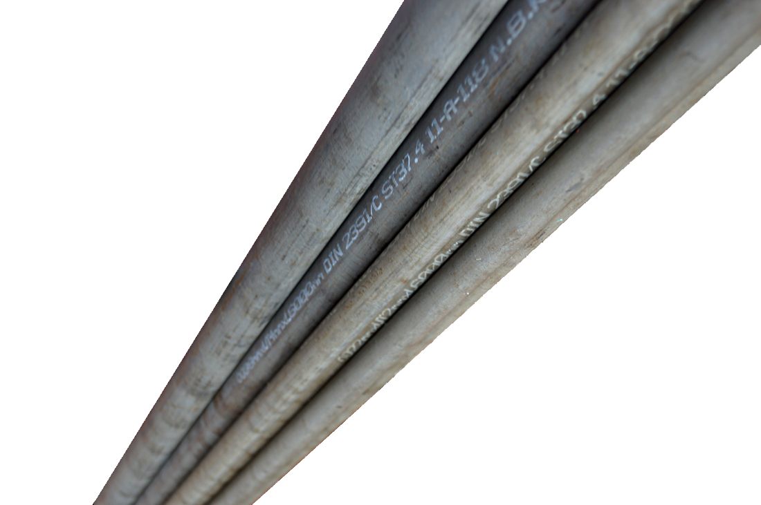 Hydraulic steel tubes in the rack, marked DIN 2391/C ST37.4 with the heat number