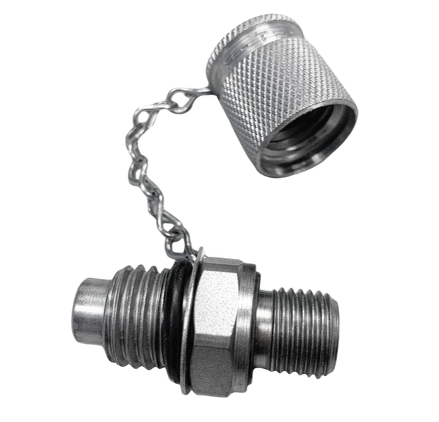A STAUFF test coupling with the protective cap removed and shown separately, revealing the ISO 15171-2 connection nipple