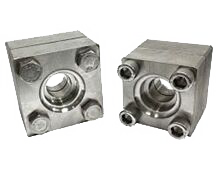 Two assembled JIS socket weld square flanges, one face on showing the socket bore and four bolt heads
