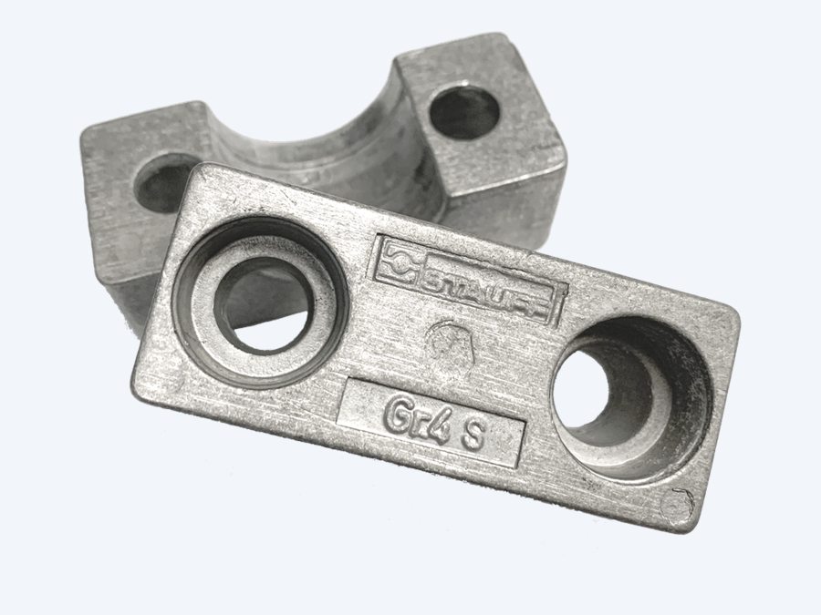 Aluminium STAUFF clamp body in silver with a machined bore, the plate stamped Gr 4 S